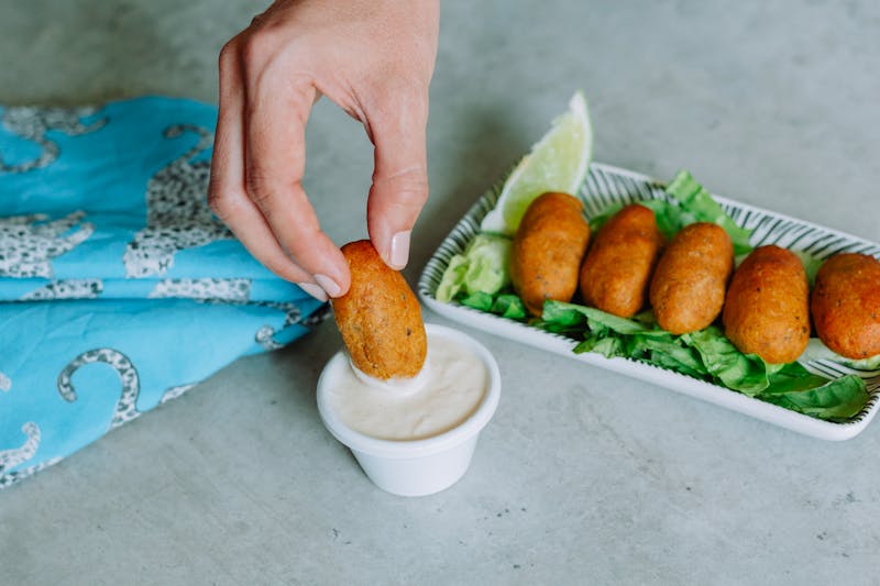 Fried mozzarella sticks with marinara sauce