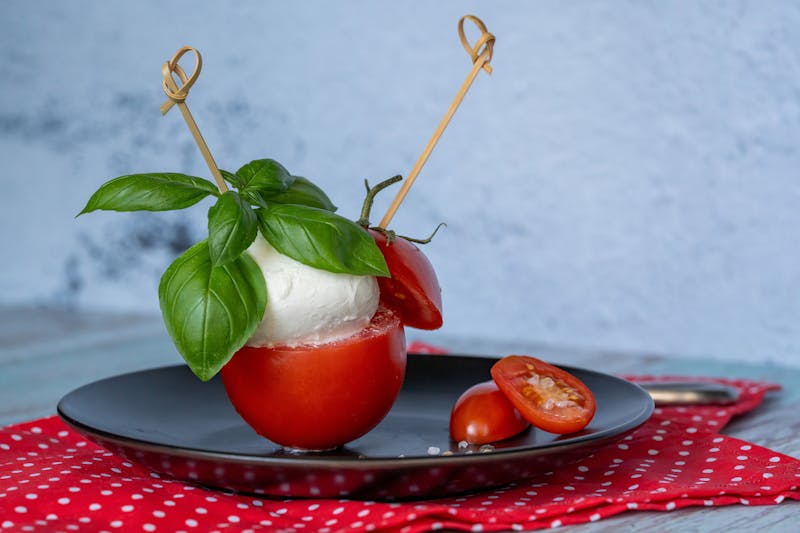 Fresh caprese salad with tomatoes and mozzarella